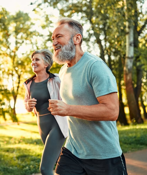 Mature couple running